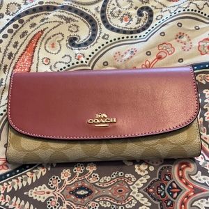 Pink and tan Coach Signature Checkbook Wallet